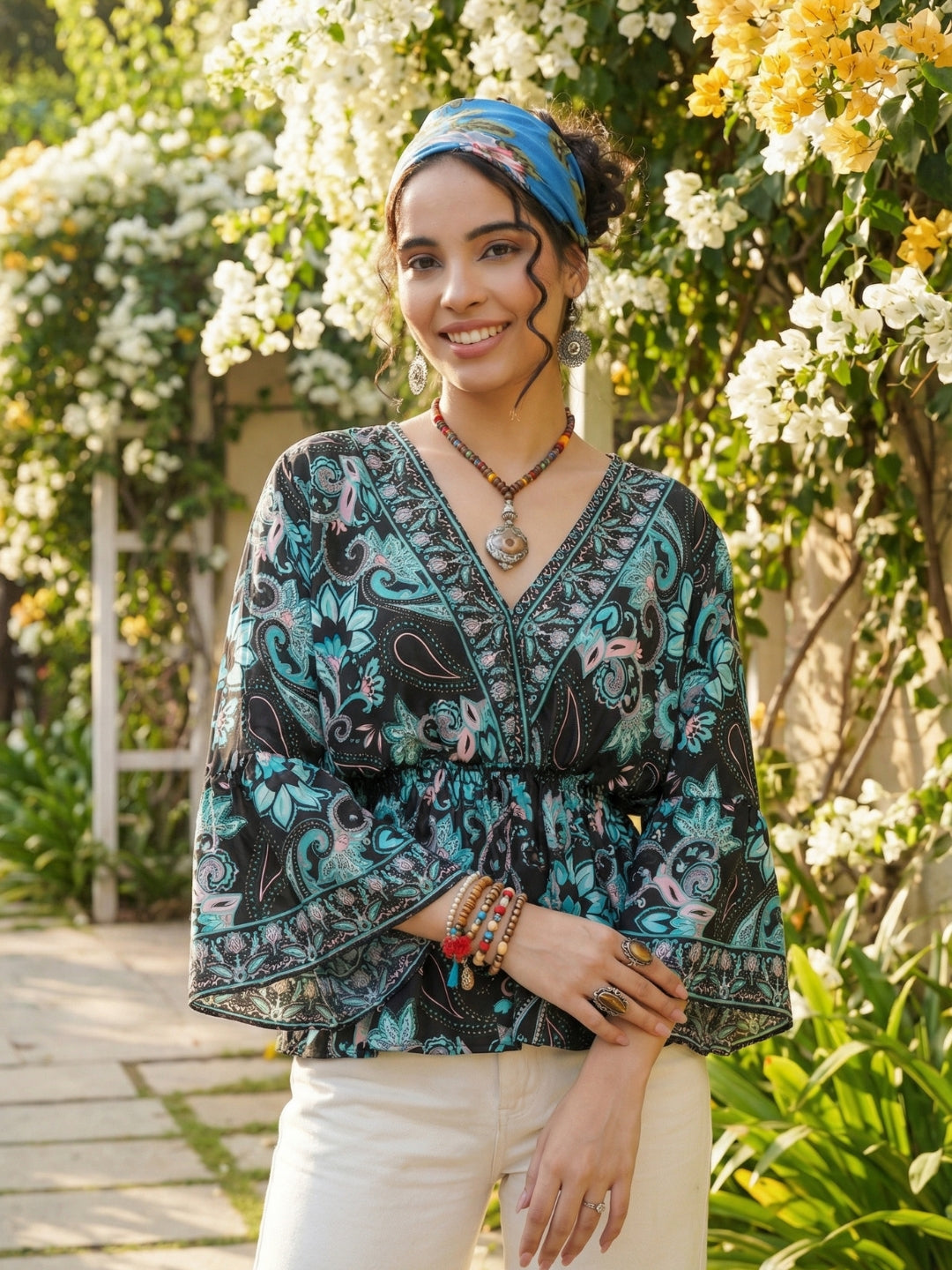 Kaelia aqua bloom peplum top