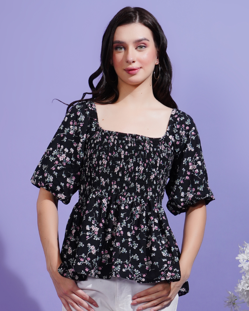 Black blossom smocked peplum stunner top