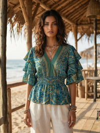 Iseren coastal muse peplum top