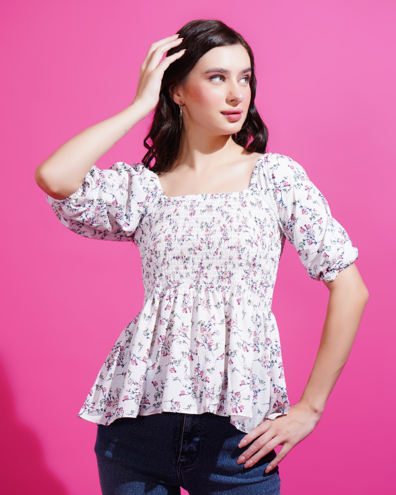 White flora smocked peplum elegance top