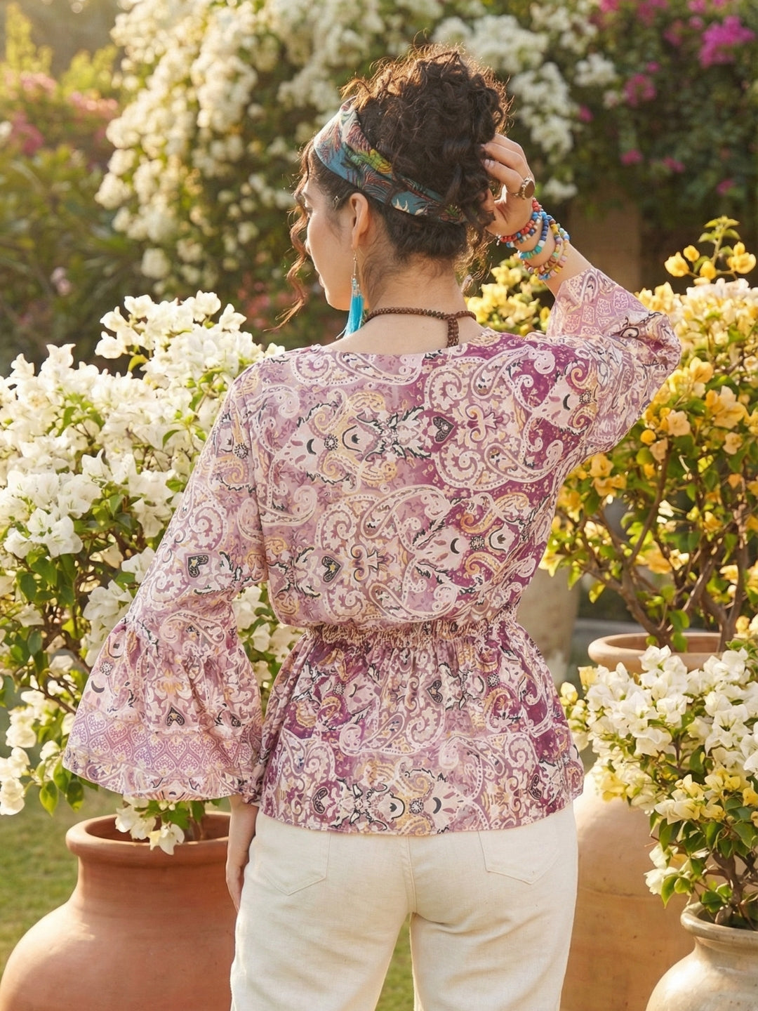 Aveline blush swirl peplum top