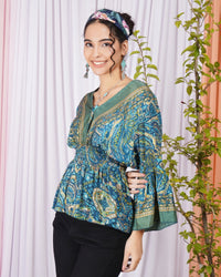 Mariel ocean muse peplum top