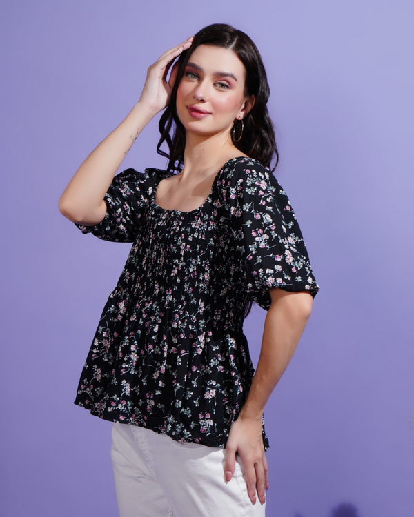 Black blossom smocked peplum stunner top