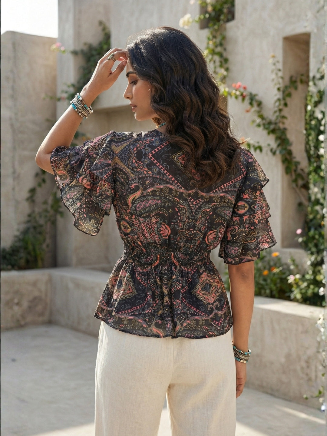 Maelira twilight vine boho peplum top