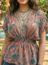 Aurelle coral meadow boho peplum top