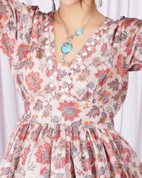 Vienna petal glow peplum top