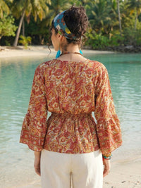 Marchelle ember bloom peplum top