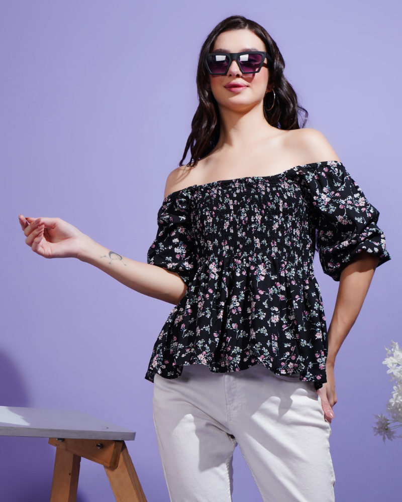 Black blossom smocked peplum stunner top