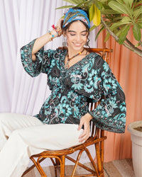 Kaelia aqua bloom peplum top