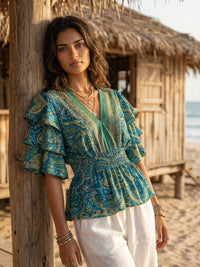 Iseren coastal muse peplum top