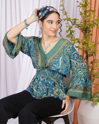 Mariel ocean muse peplum top