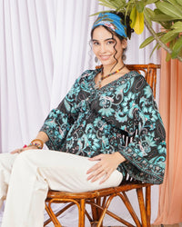 Kaelia aqua bloom peplum top